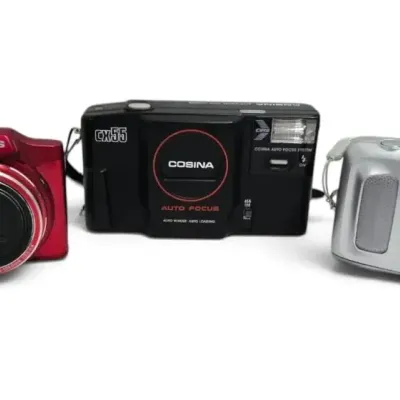 Cosina CX-55, Olympus SZ-14, & More Cameras