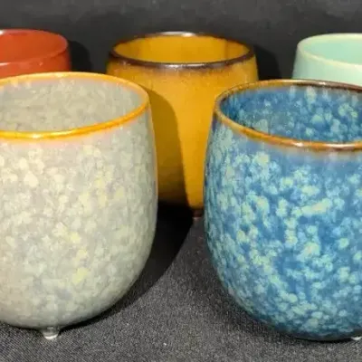 Five Small, Round, Footed Ceramic Tea Cups