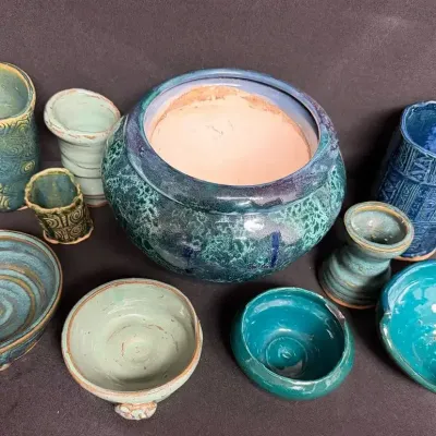 Handcrafted Ceramic Pottery Pieces Featuring Shades of Blue and Green Reactive Glazes.