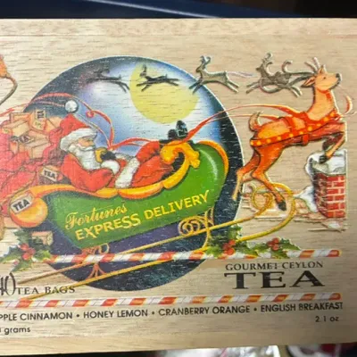 Vintage Fortunes Express Delivery wooden tea box featuring a festive illustration of Santa Claus in his sleigh.