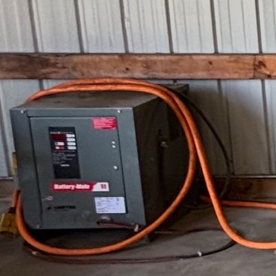Charger that goes with a forklift