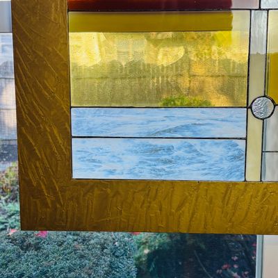 LOT 107: Abstract Geometric Stained-Glass Panel
