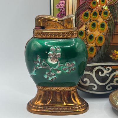 LOT 67: Vintage Floral Chinoiserie Style Geen Enamel & Gold Tone Table Lighter, Brass Manneken Pis Souvenir Ashtray & Peacock...
