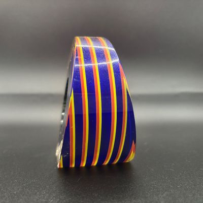 LOT 61: Blue, Red, Yellow Swirled Linear Pattern Art Glass Signed Paperweight