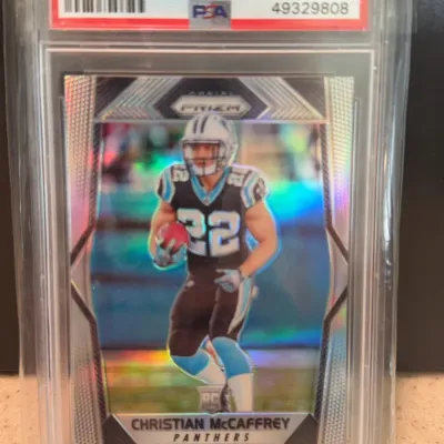 PSA-graded Mint 9 copy of a 2017 Panini Prizm Christian McCaffrey rookie card, number 249, featuring him in his Carolina Panthers uniform.