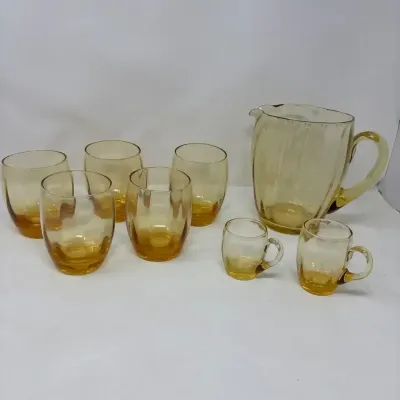 Amber Colored Pitcher And Glasses 