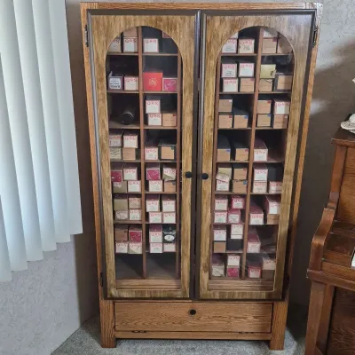 Collection Of Player Piano Music Rolls And Cabinet