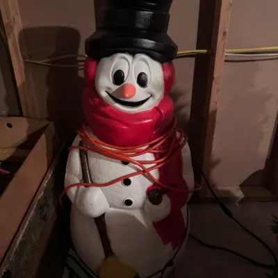 Vintage Empire blow mold Frosty the Snowman light-up holiday decoration, made in the USA, featuring a black top hat, red scarf, and broom.