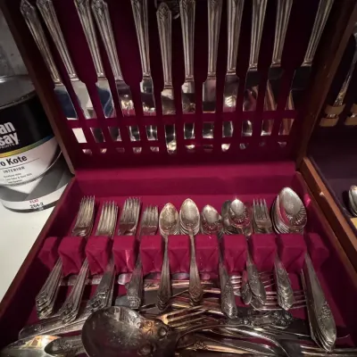 Vintage Sheffield silver-plated flatware set, made in England, featuring an elegant Art Deco pattern and housed in its original wood...
