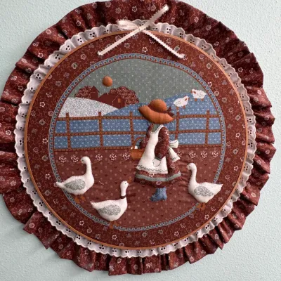 Vintage handmade country-style fabric applique wall hanging, featuring a Sunbonnet Sue-style girl with geese and sheep, framed in an...