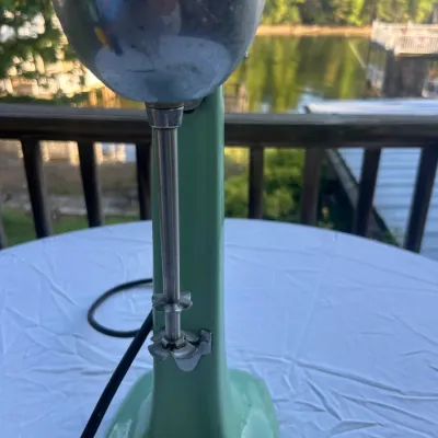 Vintage Hamilton Beach milkshake mixer in jadeite green, featuring a chrome motor housing and single spindle.
