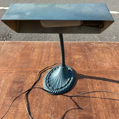 Vintage industrial-style gooseneck desk lamp with a blue-green painted finish, featuring an ornate cast metal base and a rectangular...