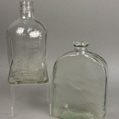 2 Vintage Clear Glass Bottles
