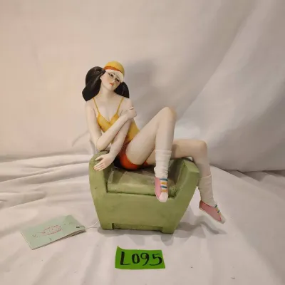 Porcelain Girl On Arm Chair