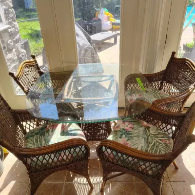 Glass Top Table And Four Arm Chairs