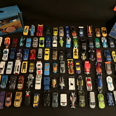 Mostly 1:64 Scale (2000's) Hot Wheels Diecast Cars with Case and Display Launcher