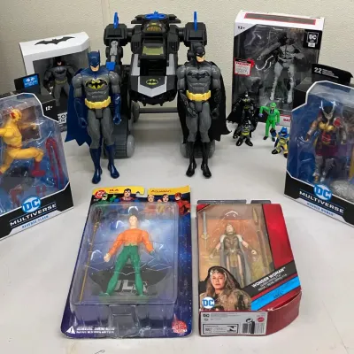 Batman, Aquaman, Wonder Woman, and Reverse-Flash 