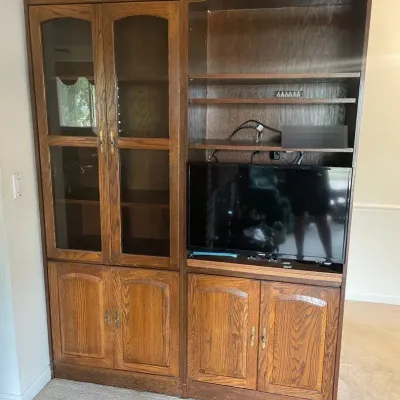 Two Oak Veneer Bookcases/Cabinets w/ Attached 28” Samsung SmartTV