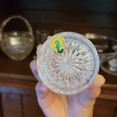 Waterford Crystal piece featuring a starburst cut pattern on the base, complete with the original green and gold seahorse sticker.