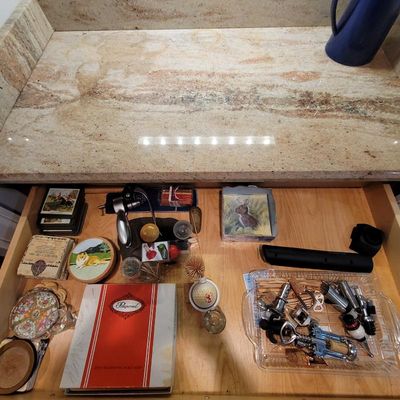 Assorted barware and entertaining accessories, including corkscrews, bottle stoppers, coasters, and a boxed set of Pimpernel placemats,...