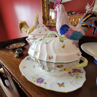 Herend porcelain soup tureen with matching underplate in the Queen Victoria pattern, displayed alongside decorative porcelain rooster...