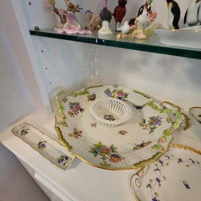 Herend Queen Victoria pattern porcelain serving platter with a central woven basket and branch-style handles, displayed alongside other...