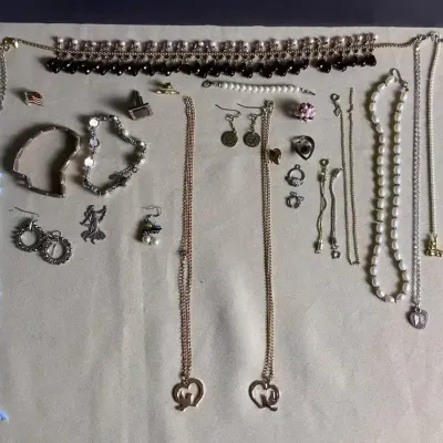 Assorted Costume Jewelry Including Necklaces, Earrings, Bracelets, And Pins