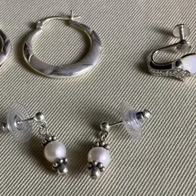 Three Pairs Of Sterling Silver Earrings 