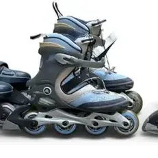 Three Pairs Of Rollerblades Of Varying Sizes