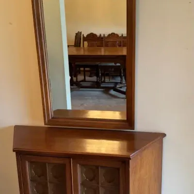 Vintage Wood Cabinet with Matching Carved Mirror Cabinet: approx. 29”H × 36”W at back × 12”D Mirror: