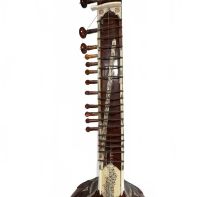 Traditional Indian sitar featuring intricate bone or celluloid inlays, carved wooden details, and a polished dark finish.