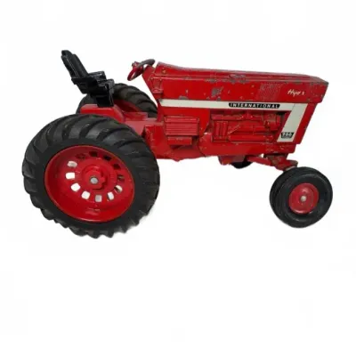 Vintage Ertl International Harvester 966 Hydro die-cast toy tractor, showing some paint wear and play-worn condition.