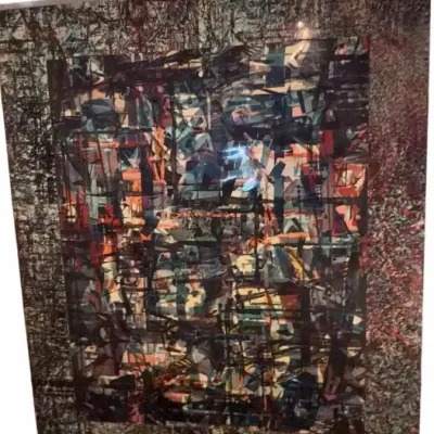 Large abstract mixed media artwork featuring a dense, layered composition of dark tones, geometric fragments, and textured borders.