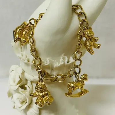 Avon Charm Bracelet with Charms