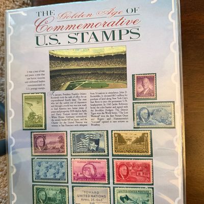 Sale Photo Thumbnail #267: "The Golden Age of Commemorative U.S. Stamps" collector's panel featuring 1945 issues, preserved in a protective plastic sleeve.