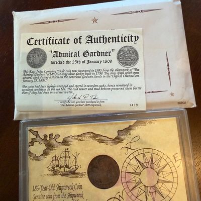 Sale Photo Thumbnail #252: Genuine East India Company "Cash" coin recovered from the 1809 shipwreck of the "Admiral Gardner," presented in a protective display case with a Certificate of Authenticity.