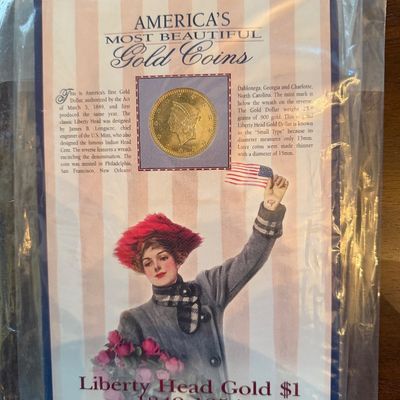 Sale Photo Thumbnail #228: Collectible Liberty Head Gold $1 coin display card, featuring historical information and an illustration of a woman holding an American flag.