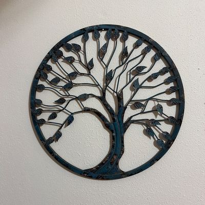 Sale Photo Thumbnail #168: Circular metal tree of life wall art with a distressed blue and bronze finish.