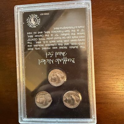 Sale Photo Thumbnail #238: The Morgan Mint Buffalo Nickel Mint Set containing three coins in a protective plastic display case.