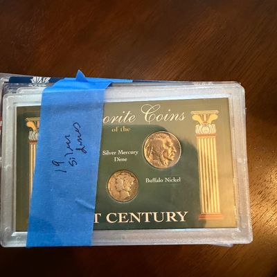 Sale Photo Thumbnail #247: Collectible coin set featuring a Silver Mercury Dime and a Buffalo Nickel, housed in a protective plastic display case.