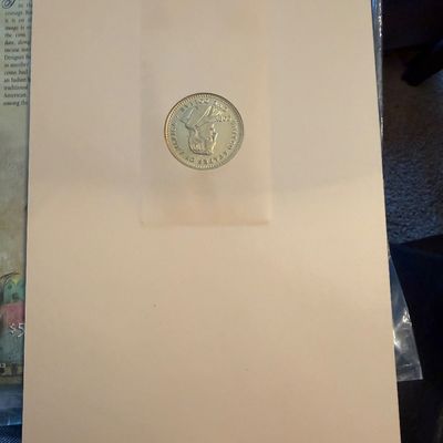 Sale Photo Thumbnail #263: The American Historic Society commemorative coin display card featuring a gold-colored replica coin.