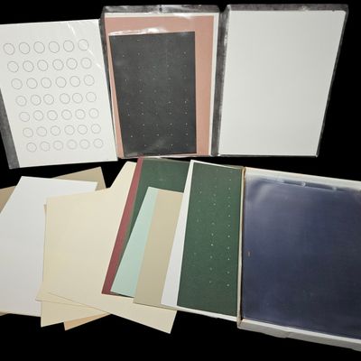 Sale Photo Thumbnail #351: An Assortment of Specialty Cardstock, Craft Paper, and Sheet Protectors