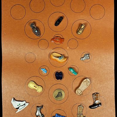 An Assortment of Vintage Novelty Shoe Buttons and Charms