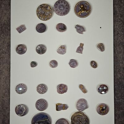 Sale Photo Thumbnail #264: A Collection of Amethyst Glass and Mixed Media Figural and Decorative Buttons