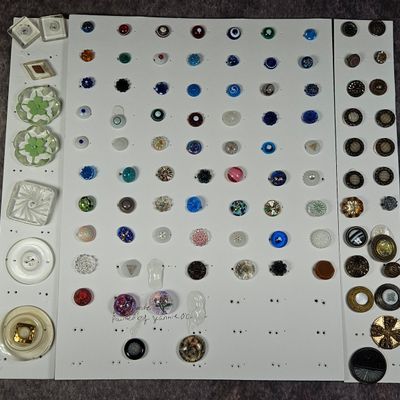 Sale Photo Thumbnail #216: A Collection of Vintage Glass and Metal Buttons Including Painted and Czech Style Examples
