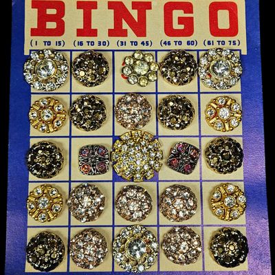 Sale Photo Thumbnail #133: A Collection of Twenty-Five Vintage Rhinestone Buttons on a Bingo Themed Card