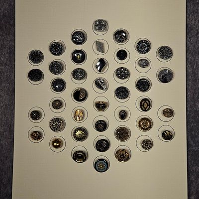 Sale Photo Thumbnail #267: An Assortment of Antique and Vintage Glass and Metal Buttons