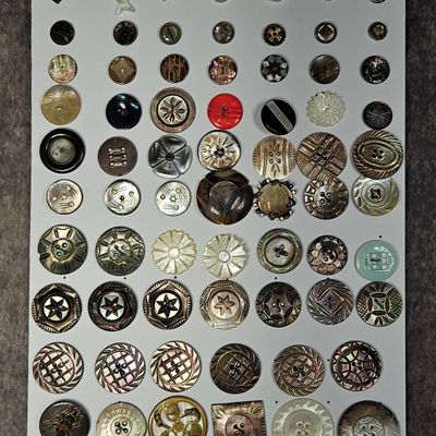 Sale Photo Thumbnail #199: An Assortment of Vintage and Antique Mother of Pearl and Mixed Media Buttons