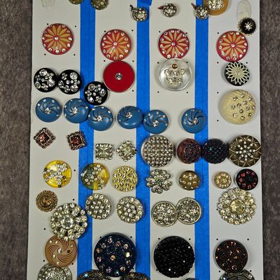 Sale Photo Thumbnail #257: A Collection of Approximately 60 Vintage Garment Buttons Featuring Celluloid Plastic and Rhinestone Embellishments