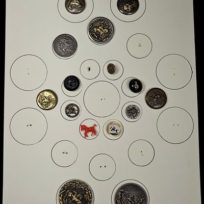A Collection of Fifteen Collectible Equestrian and St. George Themed Buttons